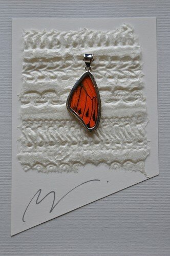 Hand made paper cards with pendant and chain attached by Plant Paper.